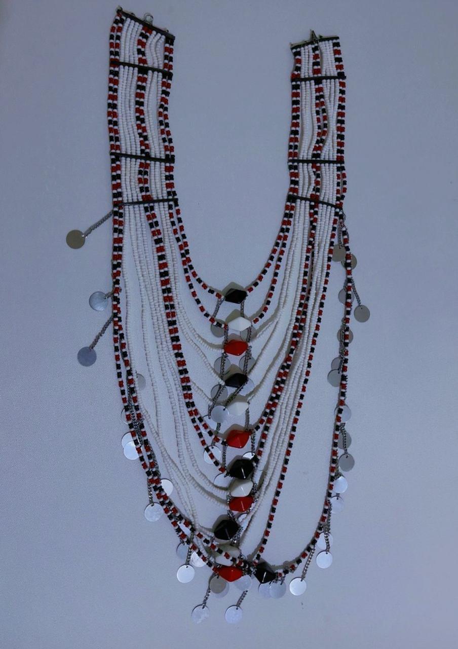 Maasai beaded neckpiece crafted by African artisans. Bold, elegant, and ethically made. Limited pieces available.