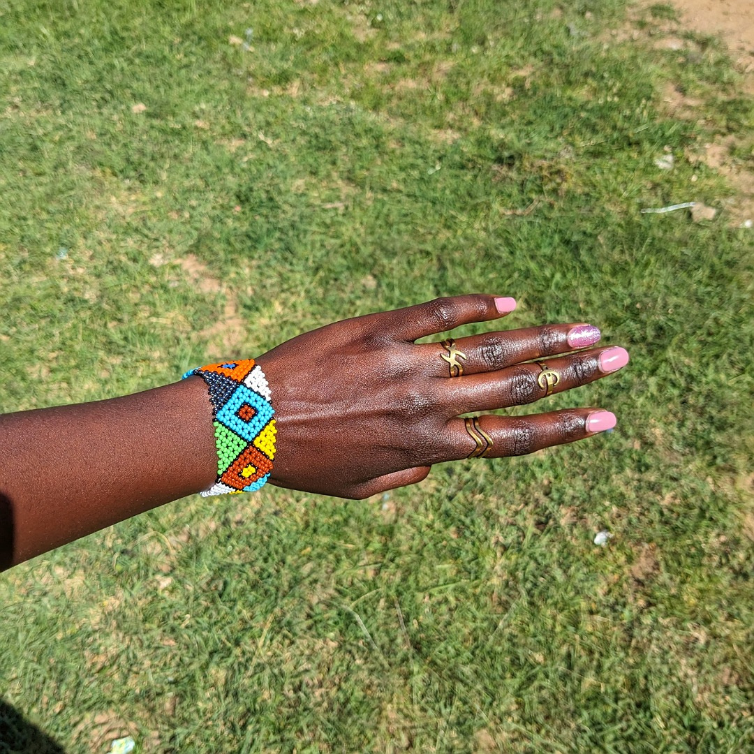 Handmade Maasai beaded bracelet with colorful traditional African patterns
