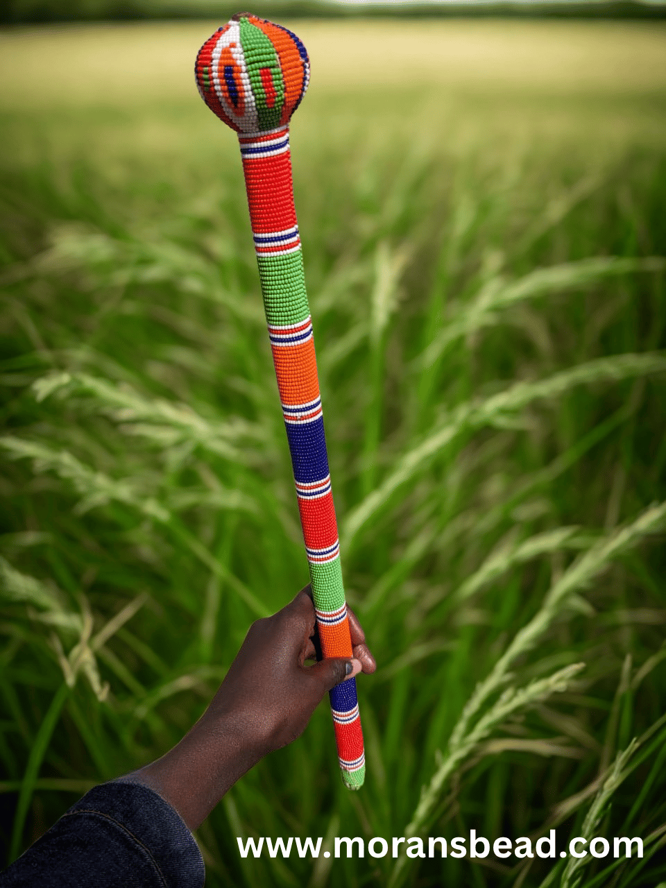 Handcrafted Maasai beaded rungu by Naiswaku fully covered in vibrant colourful traditional African seed bead patterns, made in Kenya for Moransbead as a cultural ceremonial gift