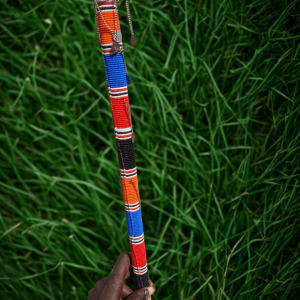 Handcrafted Maasai beaded rungu by Naiswaku fully covered in vibrant colourful traditional African seed bead patterns, made in Kenya for Moransbead as a cultural ceremonial gift