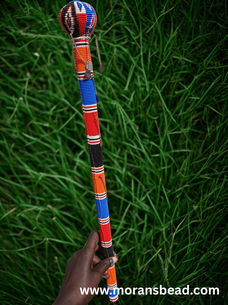 Handcrafted Maasai beaded rungu by Naiswaku fully covered in vibrant colourful traditional African seed bead patterns, made in Kenya for Moransbead as a cultural ceremonial gift