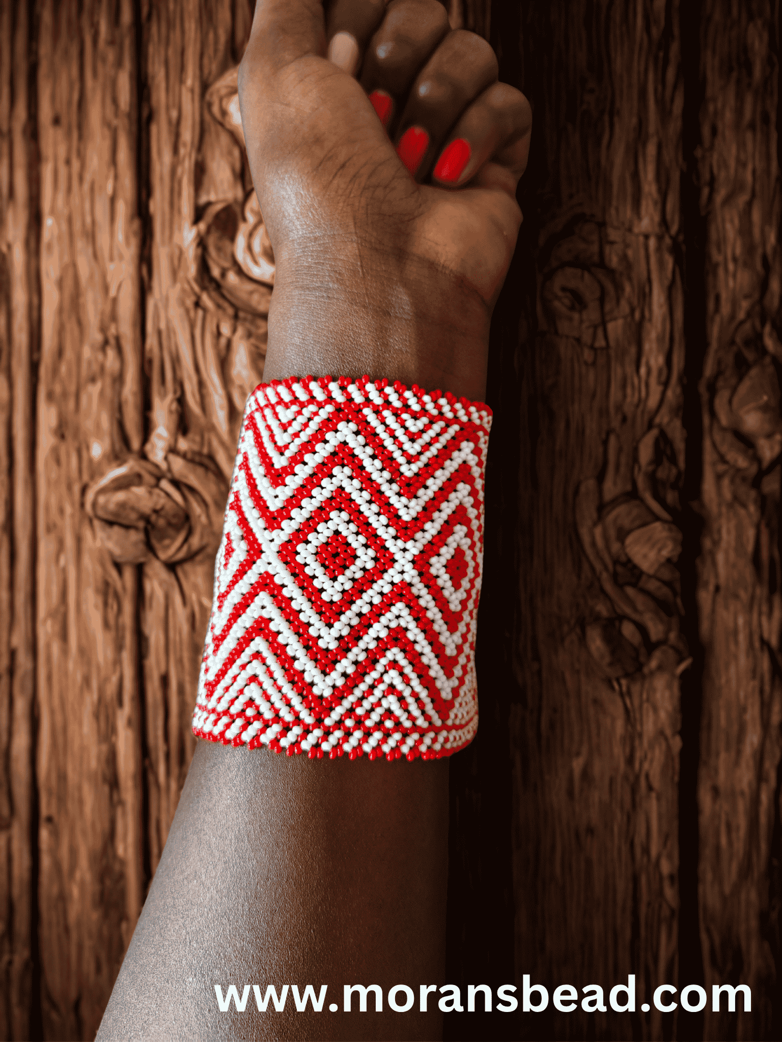 Handcrafted Maasai beaded wide cuff bracelet by Sianto featuring vibrant colourful traditional African seed bead patterns, made in Kenya for Moransbead