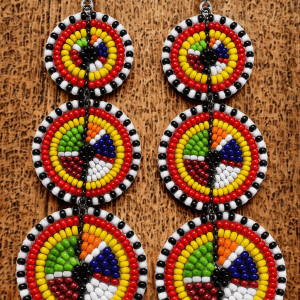 Handcrafted Maasai beaded drop dangle earrings by Kisieku featuring vibrant colourful traditional African seed bead patterns, lightweight and elegant, made in Kenya for Moransbead