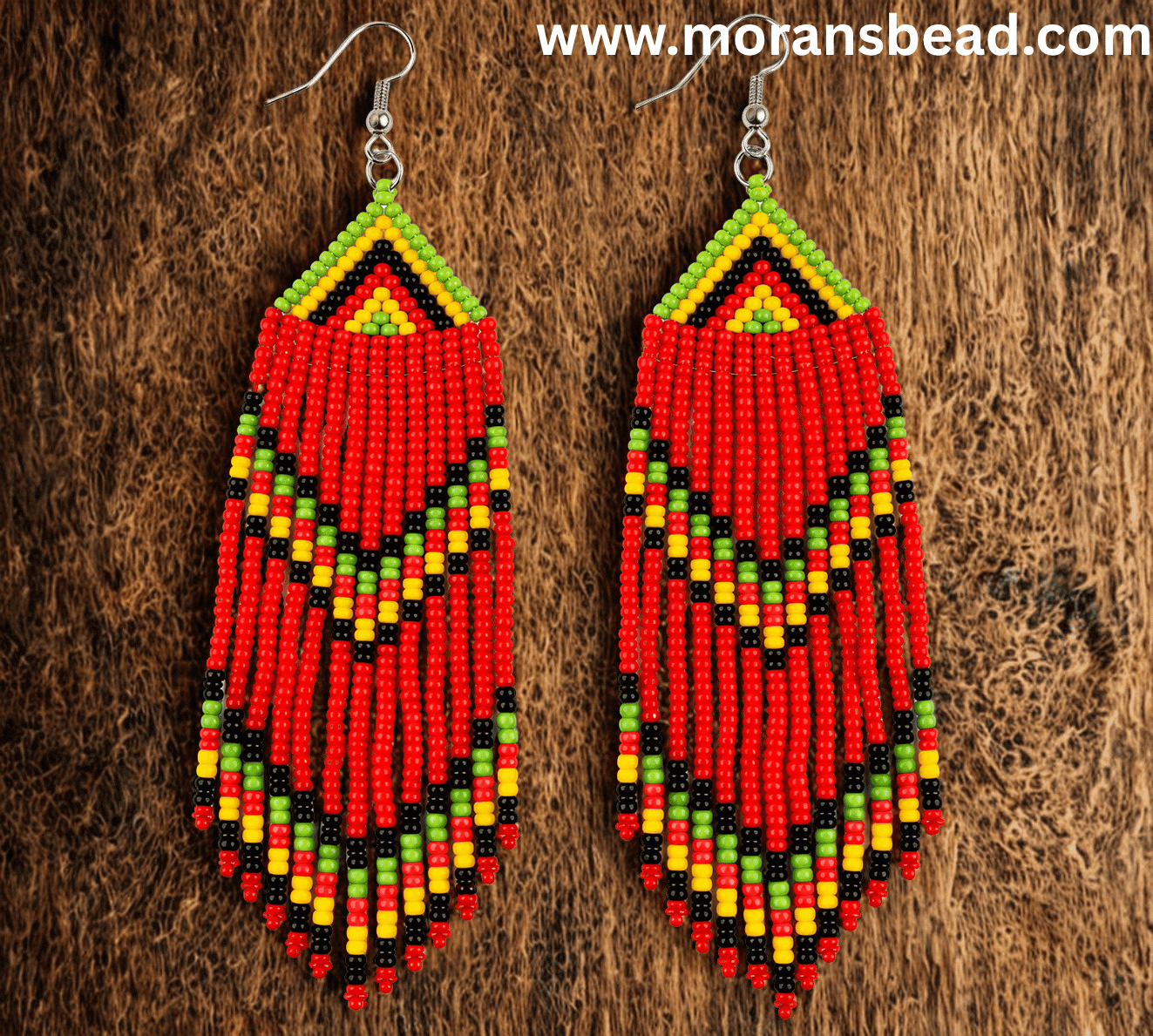 Handcrafted Maasai beaded drop dangle earrings by Kisieku featuring vibrant colourful traditional African seed bead patterns, lightweight and elegant, made in Kenya for Moransbead