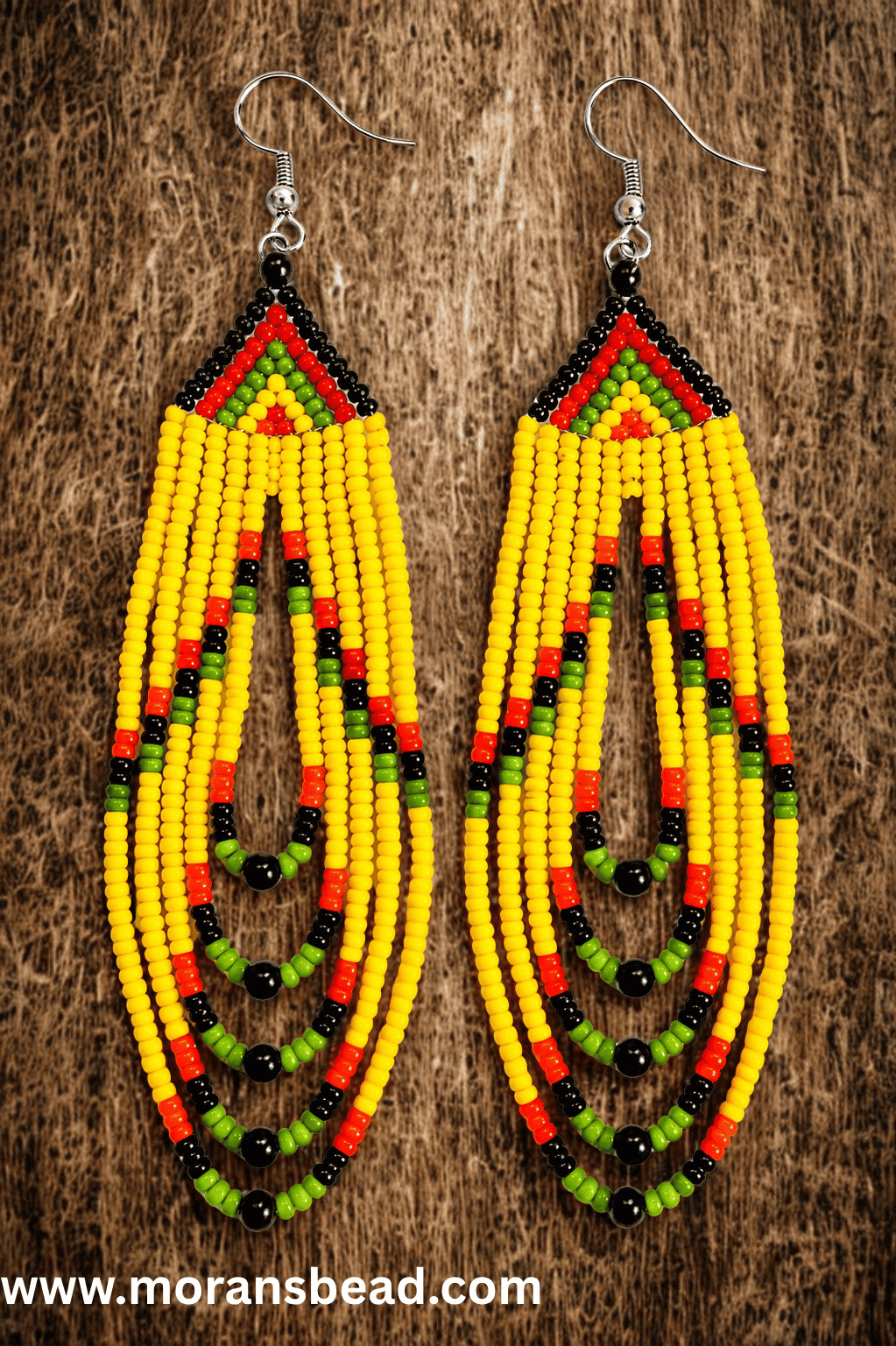 Handcrafted Maasai beaded drop dangle earrings by Kisieku featuring vibrant colourful traditional African seed bead patterns, lightweight and elegant, made in Kenya for Moransbead