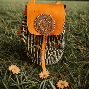 Handcrafted Maasai sisal beaded monkey crossbody bag by Naiswaku, featuring woven sisal body with colourful Maasai bead detail and genuine leather strap, made in Kenya for Moransbead