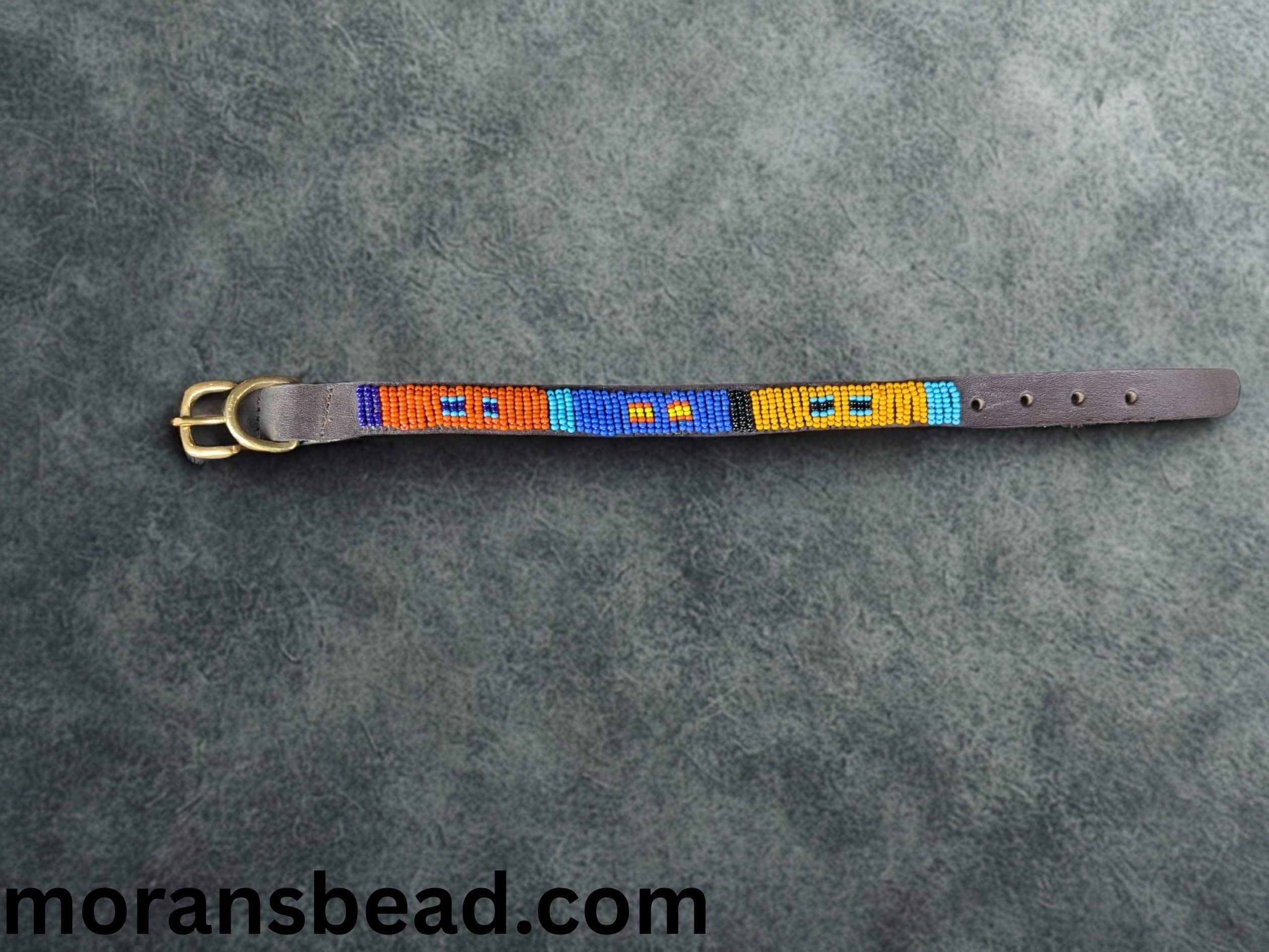Beaded dog collar with colorful patterns and a gold buckle, handcrafted by Morans Bead. Perfect for.