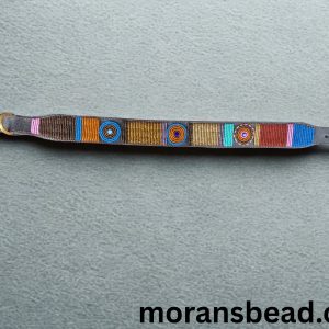 Vibrant beaded dog collar with colorful patterns and adjustable strap.