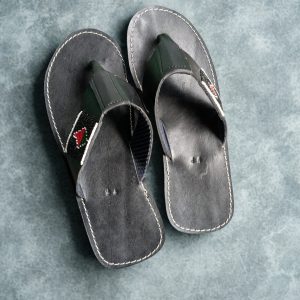 Handcrafted Maasai beaded leather sandals for men by Kisieku featuring vibrant colourful traditional African seed bead patterns on genuine leather straps and sole, made in Kenya for Moransbead